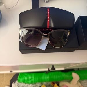 Prada Black and Gold Sunglasses